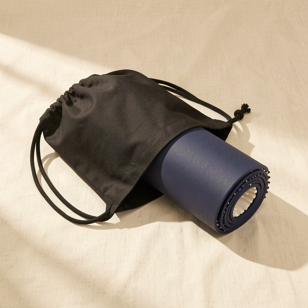 The Restveta mat rolled into its carry bag